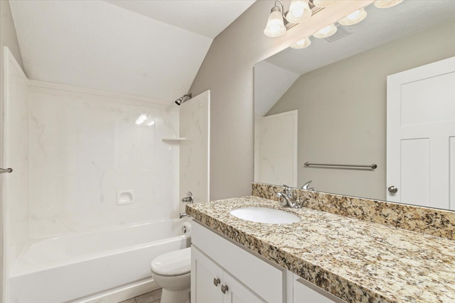 857 225 South Springville, UT 84663 - Photo 18 of 23 Bathroom vanity with a granite countertop, undermount sink, and chrome faucet