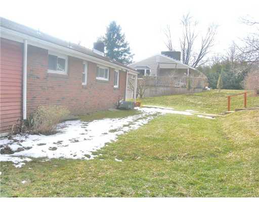 7808 Noblestown Road McDonald, PA 15057 - Photo 12 of 14 Exterior Back. The backyard is flat and useable.