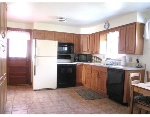 7808 Noblestown Road McDonald, PA 15057 - Photo 4 of 14 Kitchen. The eat-in-kitchen has been completed updated, cabinets, ceramic tile floor. The home conveys with all of the appliances.