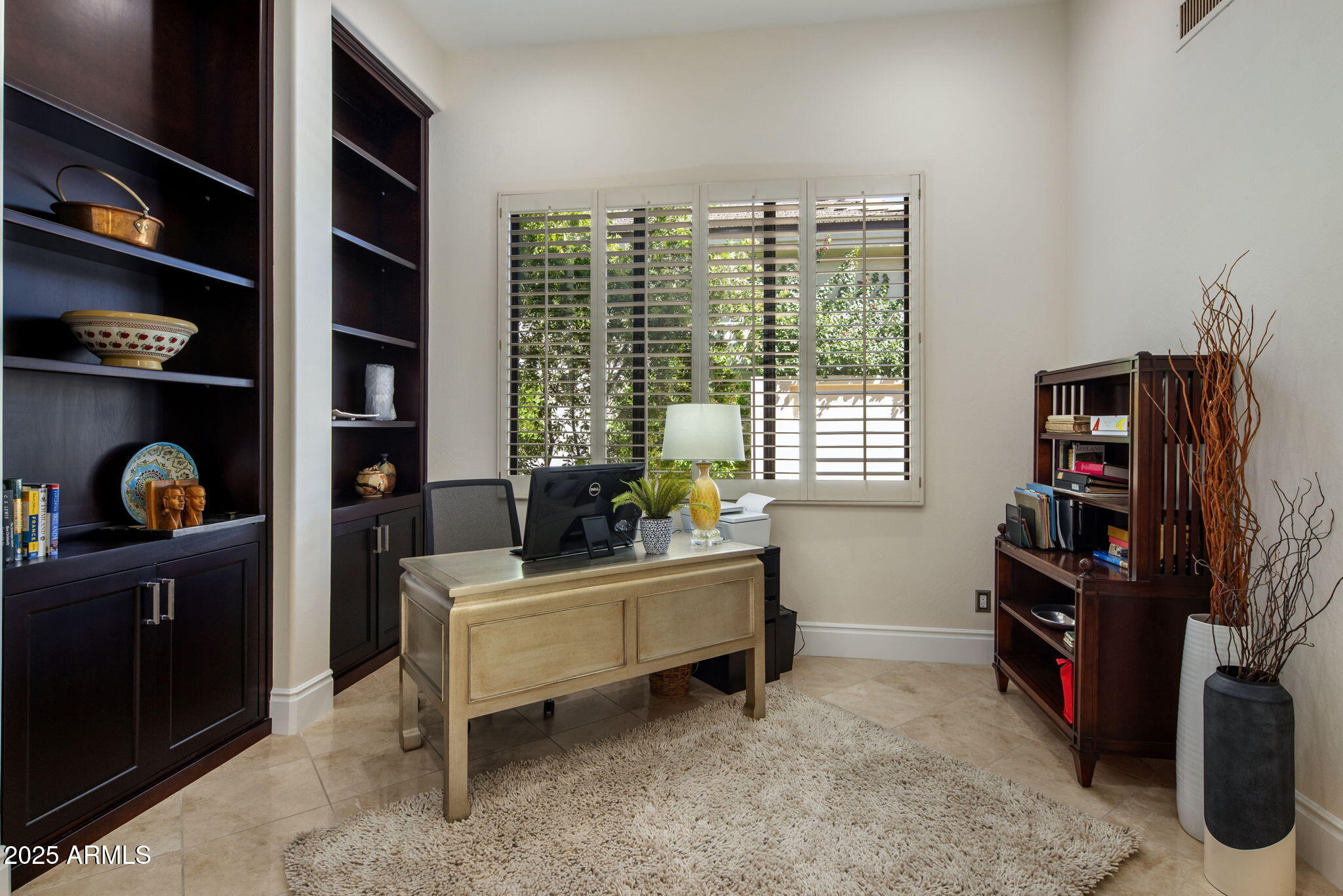 8216 East Angel Spirit Drive Scottsdale, AZ 85255 - Photo 14 of 29 a living room with furniture cabinets and window