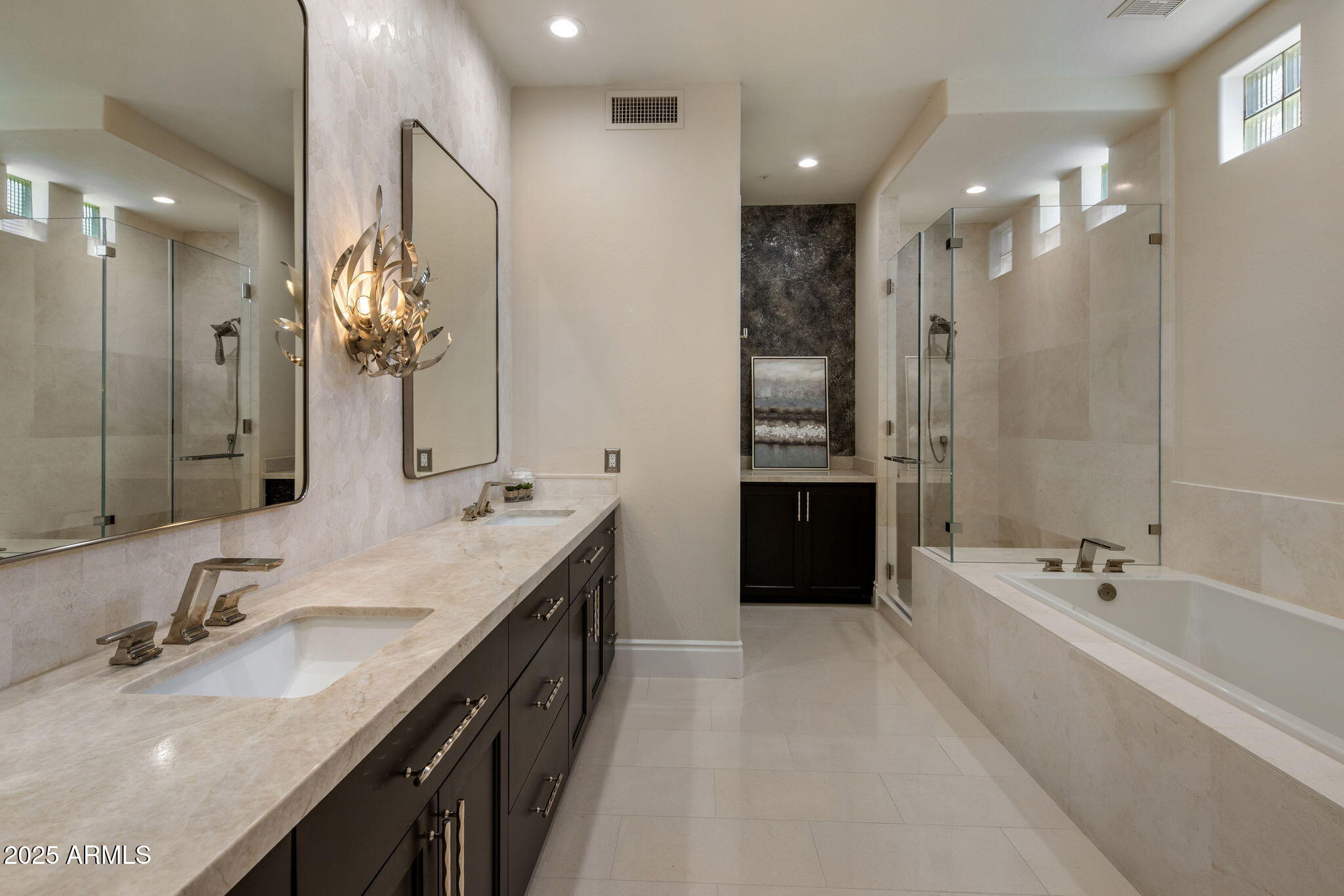 8216 East Angel Spirit Drive Scottsdale, AZ 85255 - Photo 17 of 29 a spacious bathroom with a bathtub double sink shower and mirror