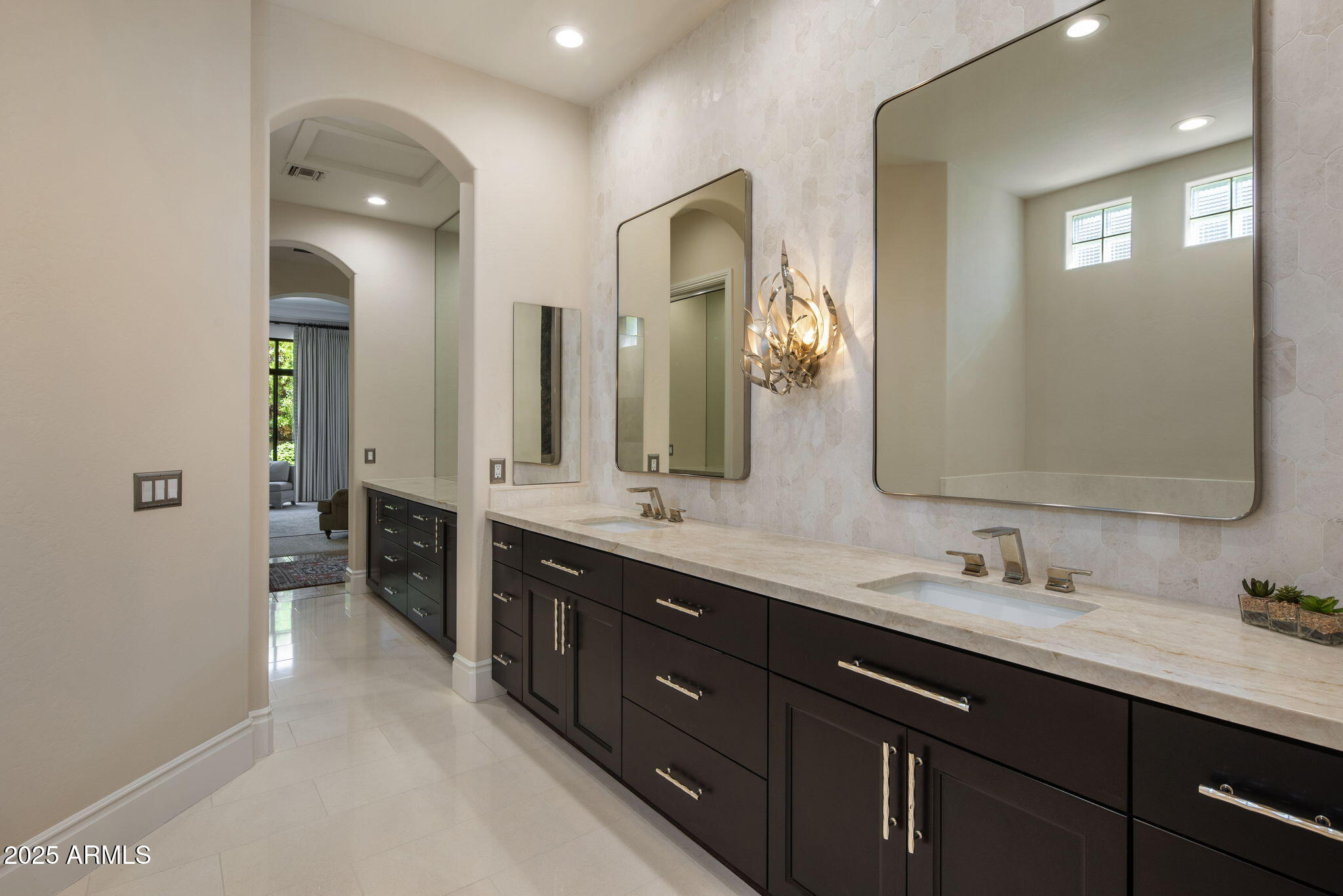 8216 East Angel Spirit Drive Scottsdale, AZ 85255 - Photo 18 of 29 a bathroom with double vanity sinks and a large mirror