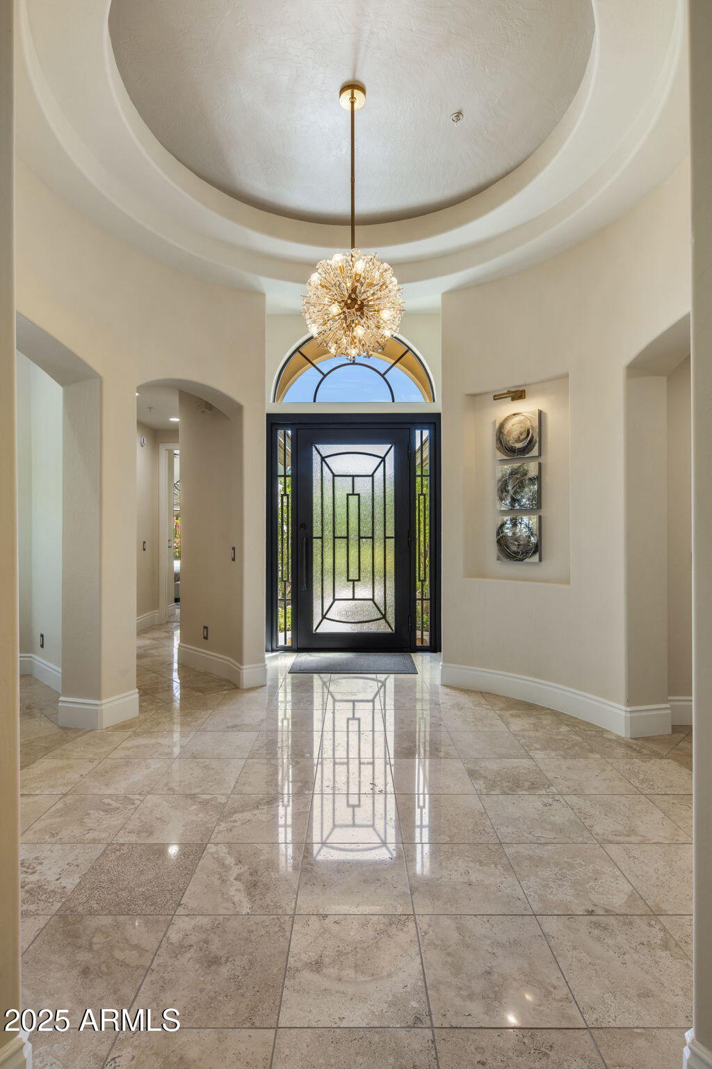 8216 East Angel Spirit Drive Scottsdale, AZ 85255 - Photo 2 of 29 a view of an entryway with a chandelier