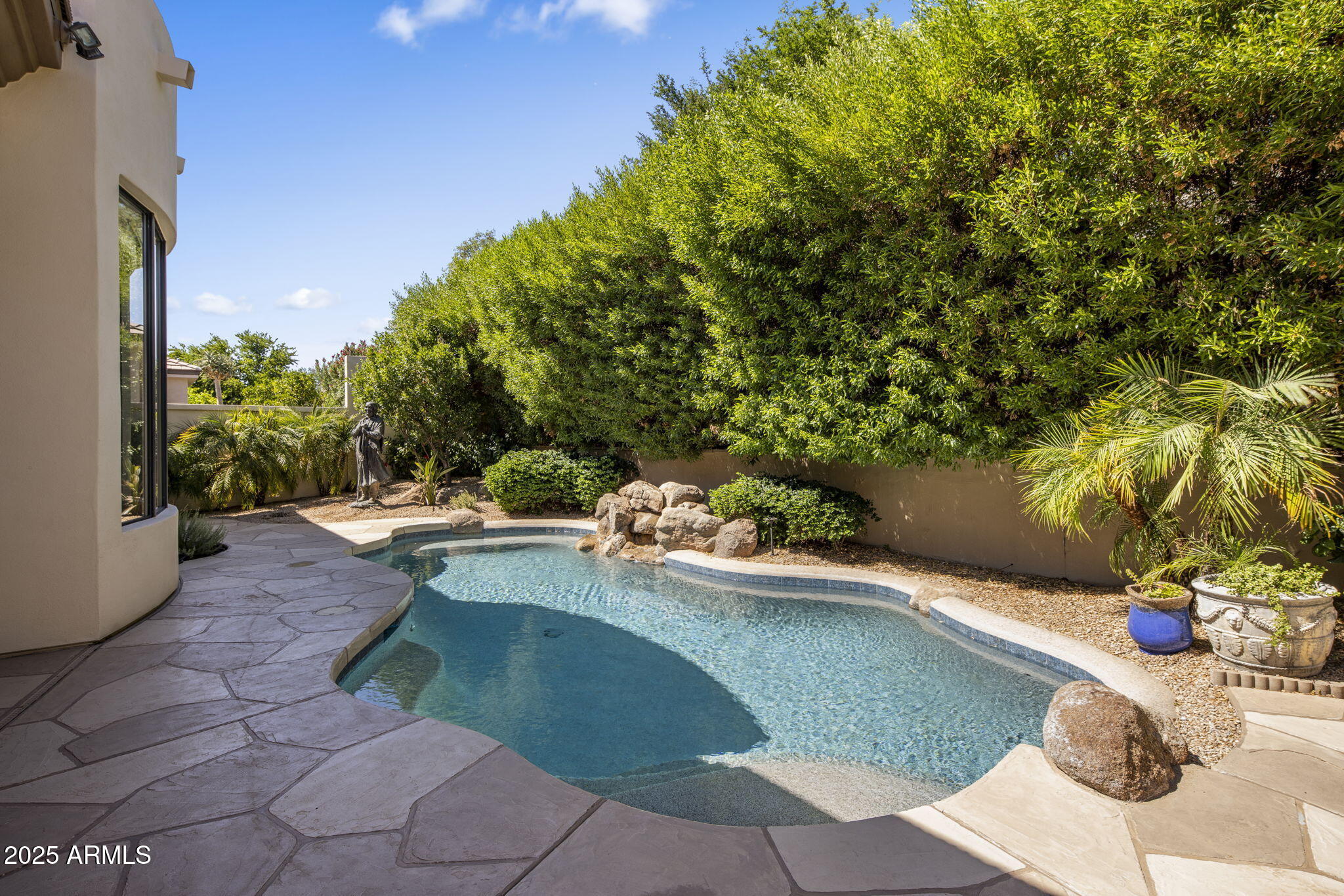 8216 East Angel Spirit Drive Scottsdale, AZ 85255 - Photo 24 of 29 a view of a swimming pool with lounge chair