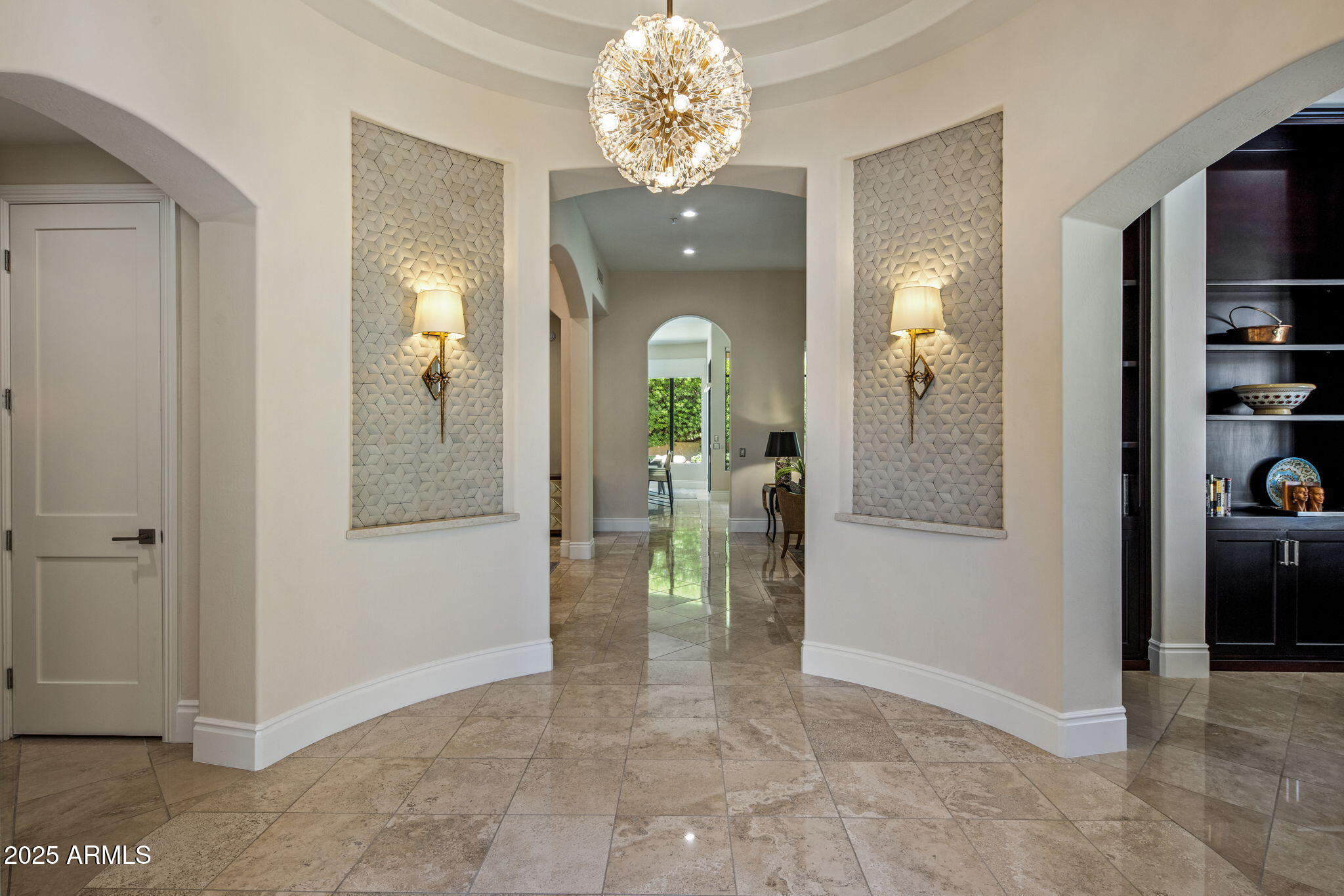8216 East Angel Spirit Drive Scottsdale, AZ 85255 - Photo 3 of 29 wooden floor and hallway with chandelier