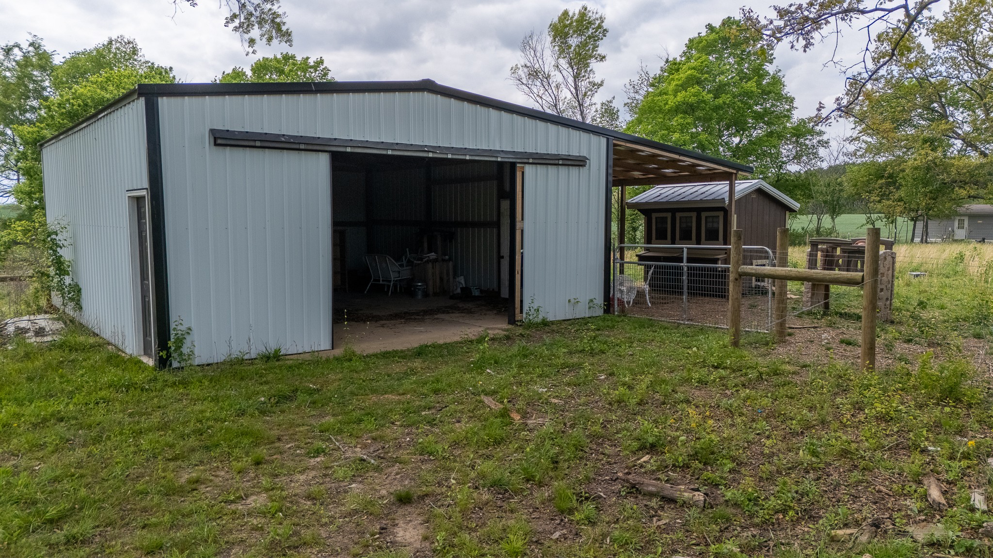 521 Revilo Road Leoma, TN 38468 - Photo 11 of 14 a view of a house with backyard and garden