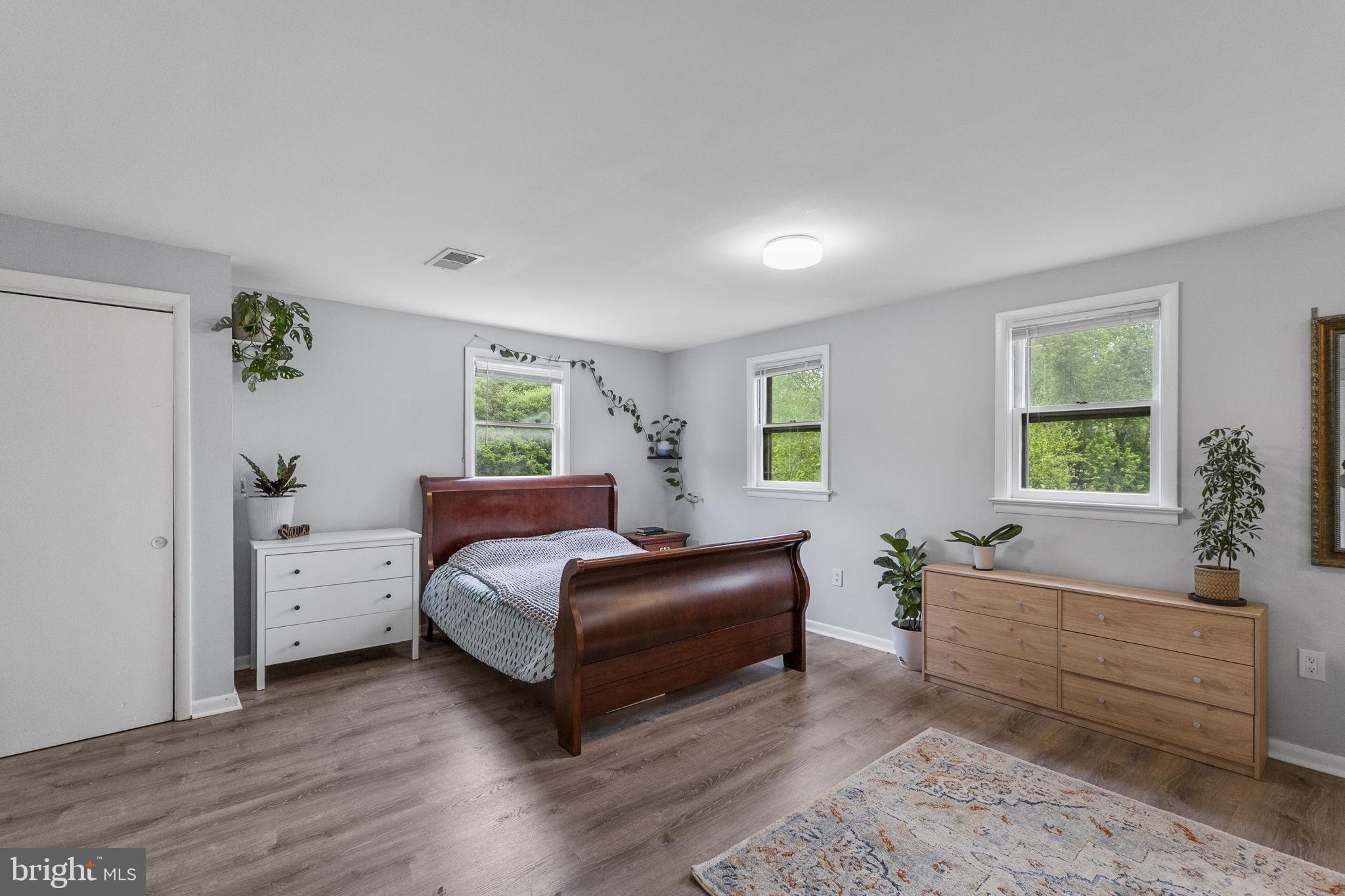 26001 Frederick Road Clarksburg, MD 20871 - Photo 16 of 46 a bedroom with a bed and a window