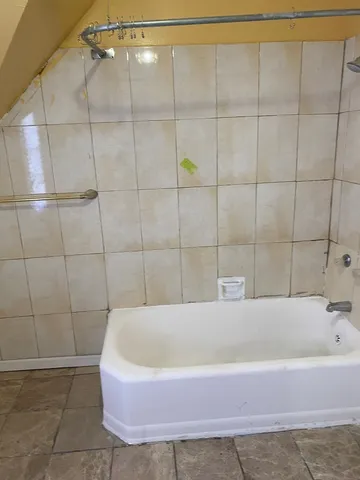 a bathroom with a bathtub