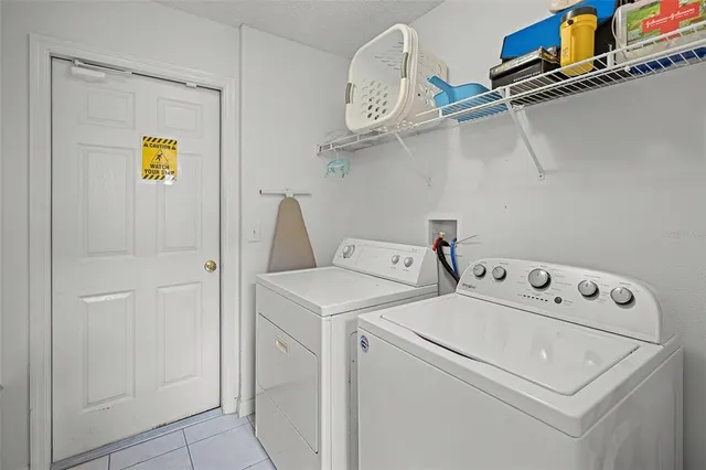 a view of kitchen and dining area with furniture