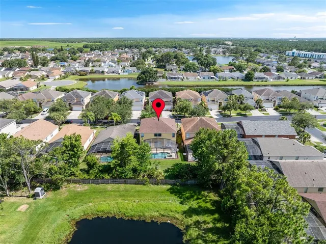 a view of a lake with a house