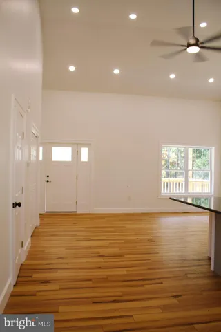 a view of an ocean & kitchen with a window