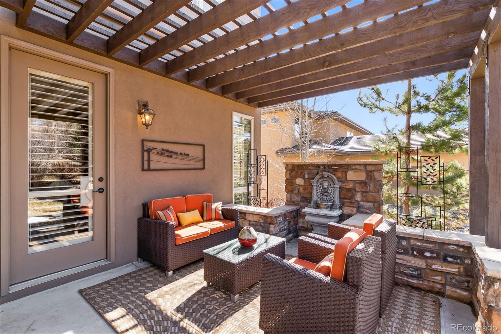 981 Buffalo Ridge Road Castle Pines, CO 80108 - Photo 33 of 39 a outdoor living space with furniture