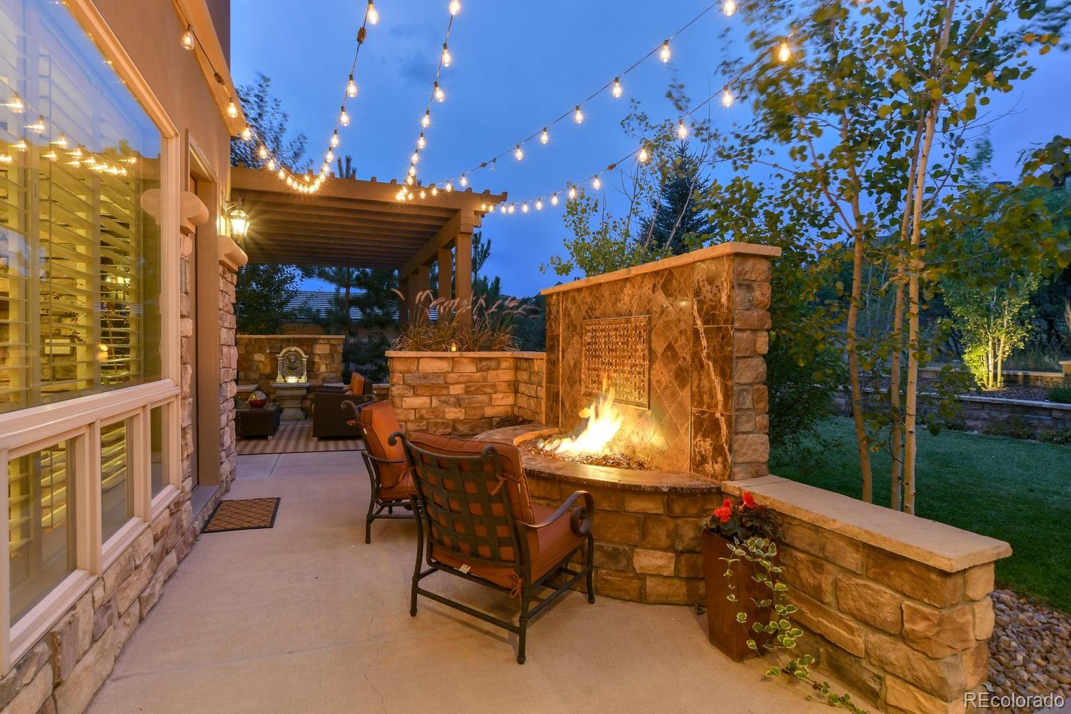 981 Buffalo Ridge Road Castle Pines, CO 80108 - Photo 35 of 39 a view of an outdoor sitting area