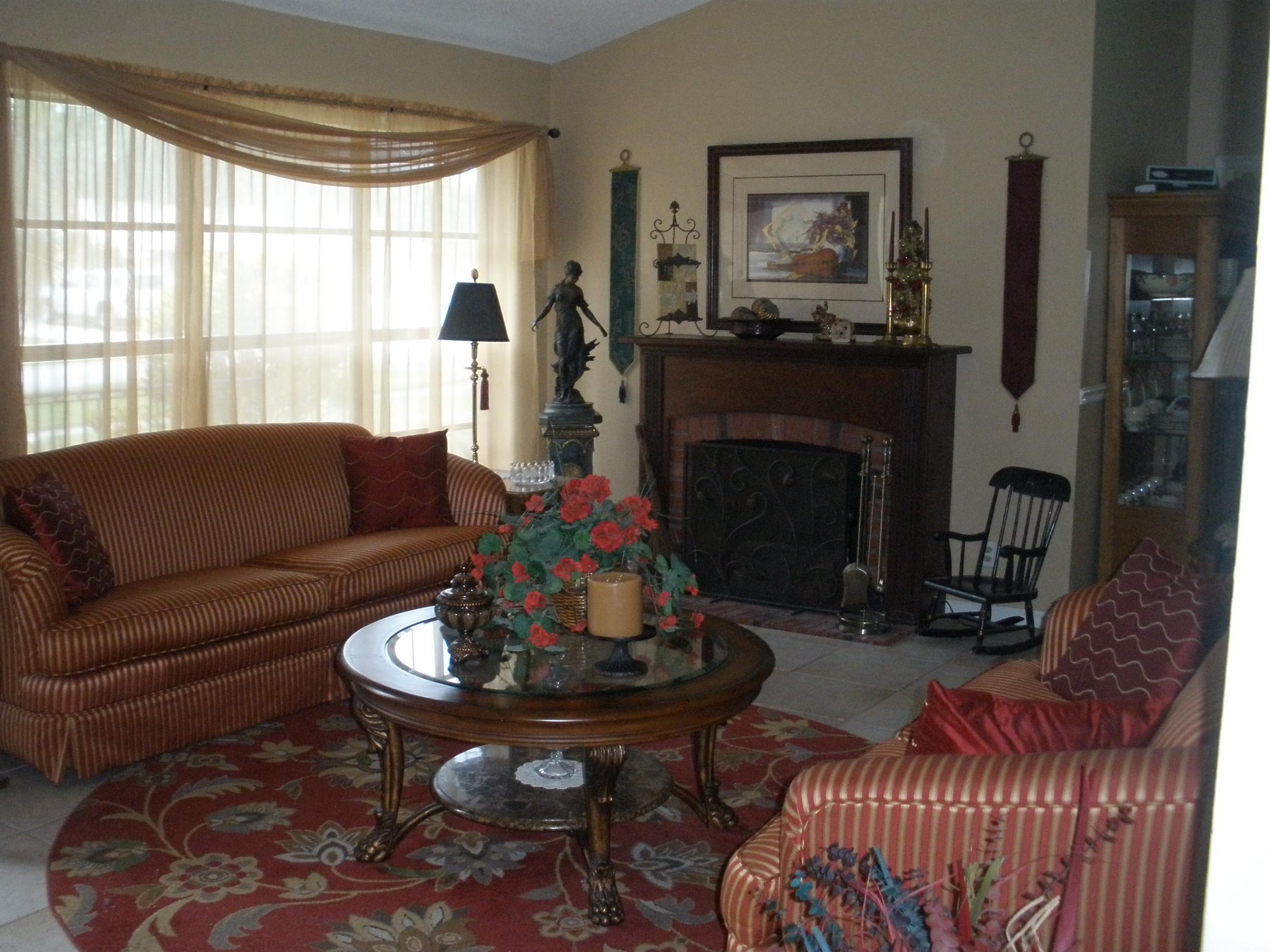 21293 Purple Sage Lane Boca Raton, FL 33428 - Photo 6 of 10 a living room with furniture and a fireplace