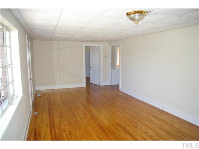 911 Shepard School Road Zebulon, NC 27597 - Photo 5 of 7 Living/family room with beautiful hardwood floors