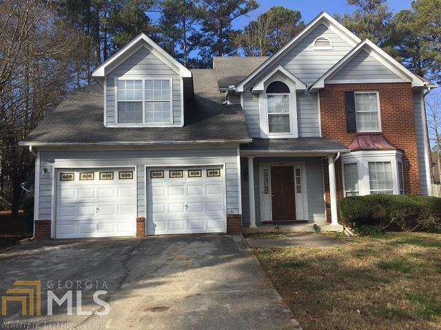 947 Spring Drive Jonesboro, GA 30238 - Photo 1 of 1 a front view of a house with a yard