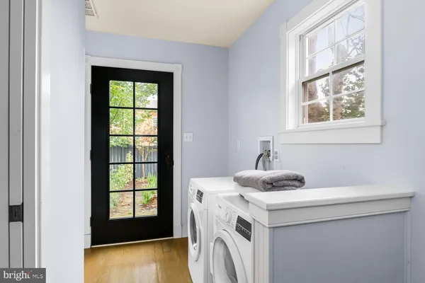 a bathroom with a sink and a window