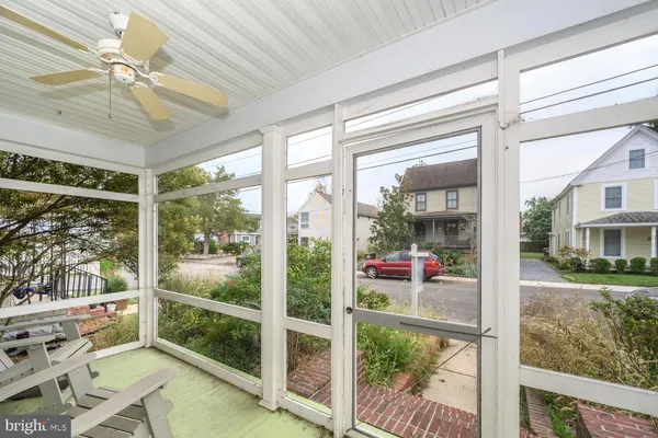 a view of a porch with a furniture