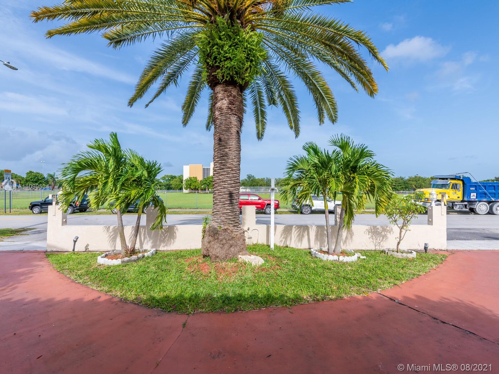 2820 Southwest 95th Avenue Miami, FL 33165 - Photo 17 of 100 a palm tree sitting in front of a building