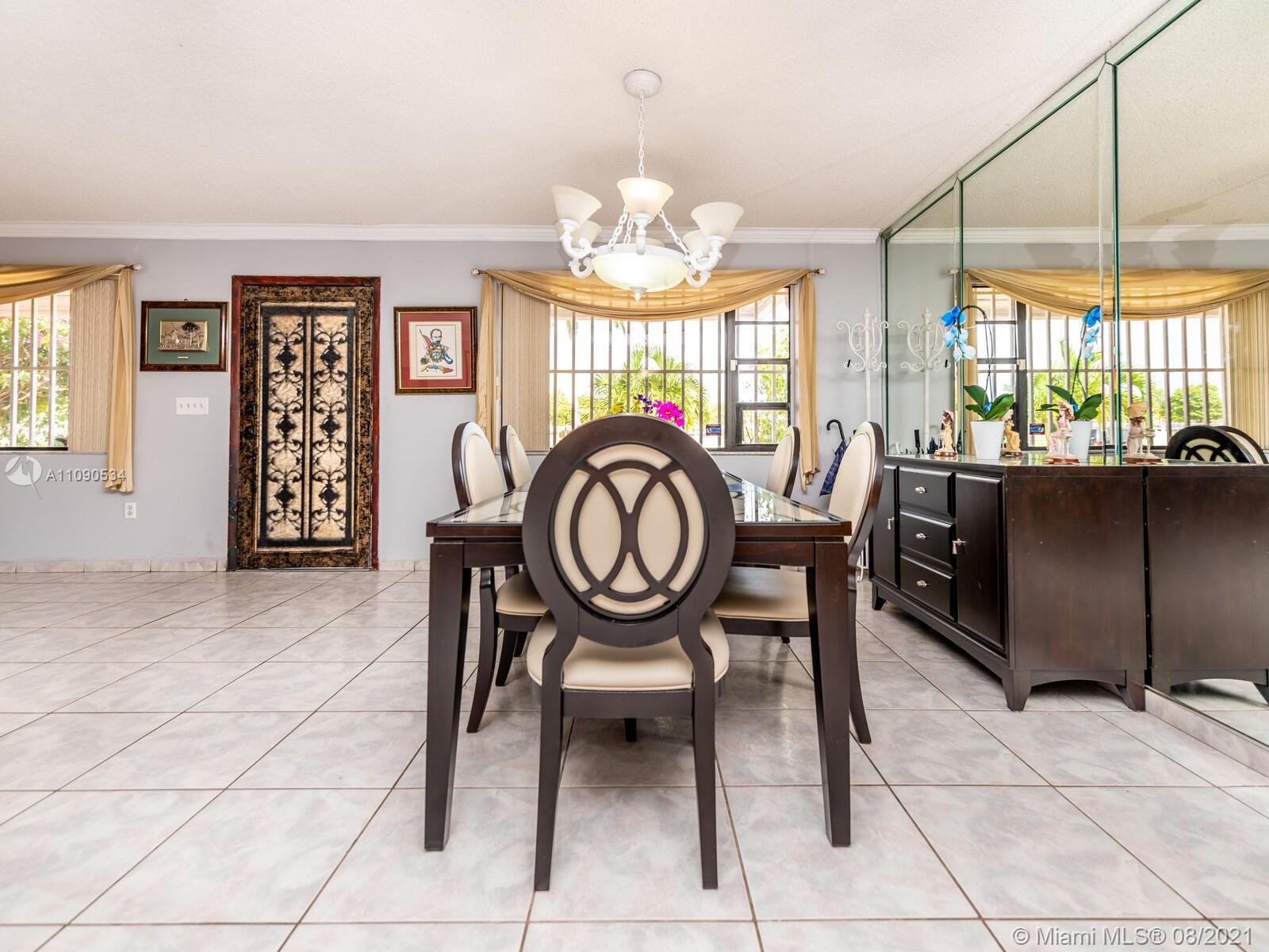2820 Southwest 95th Avenue Miami, FL 33165 - Photo 21 of 100 a view of a dining room with furniture window and outside view