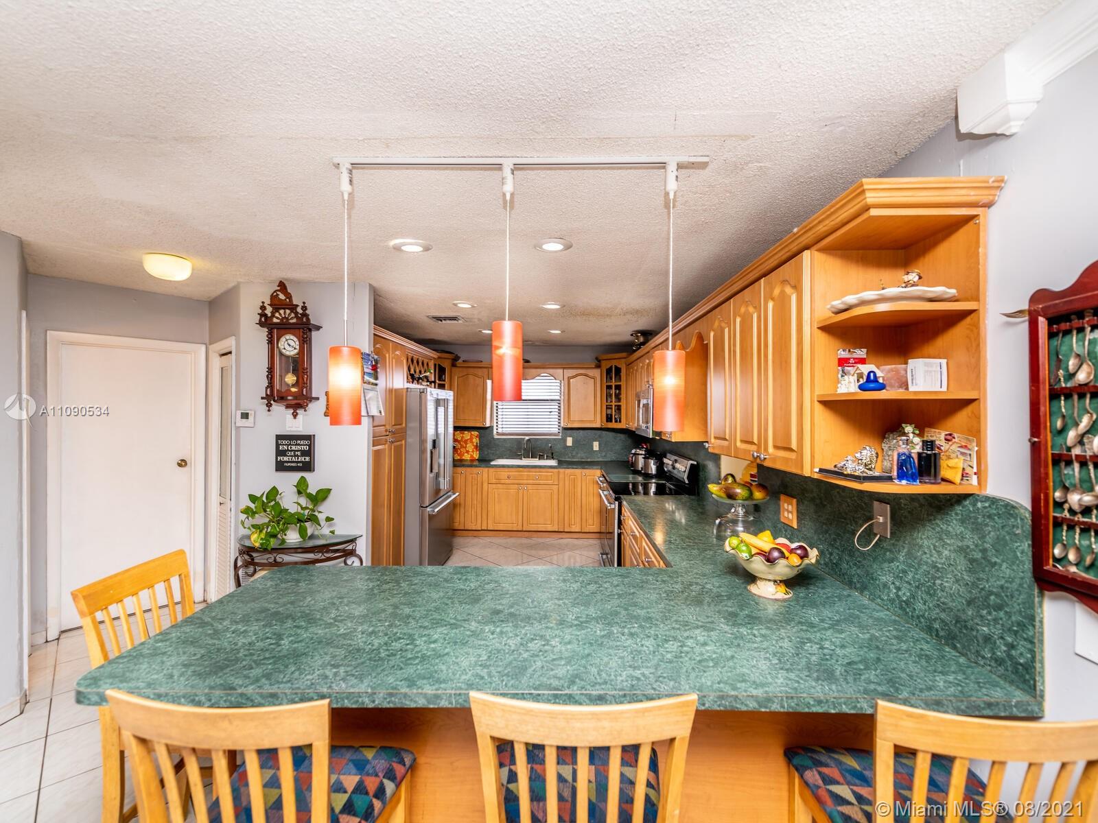2820 Southwest 95th Avenue Miami, FL 33165 - Photo 30 of 100 a view of a living room and kitchen