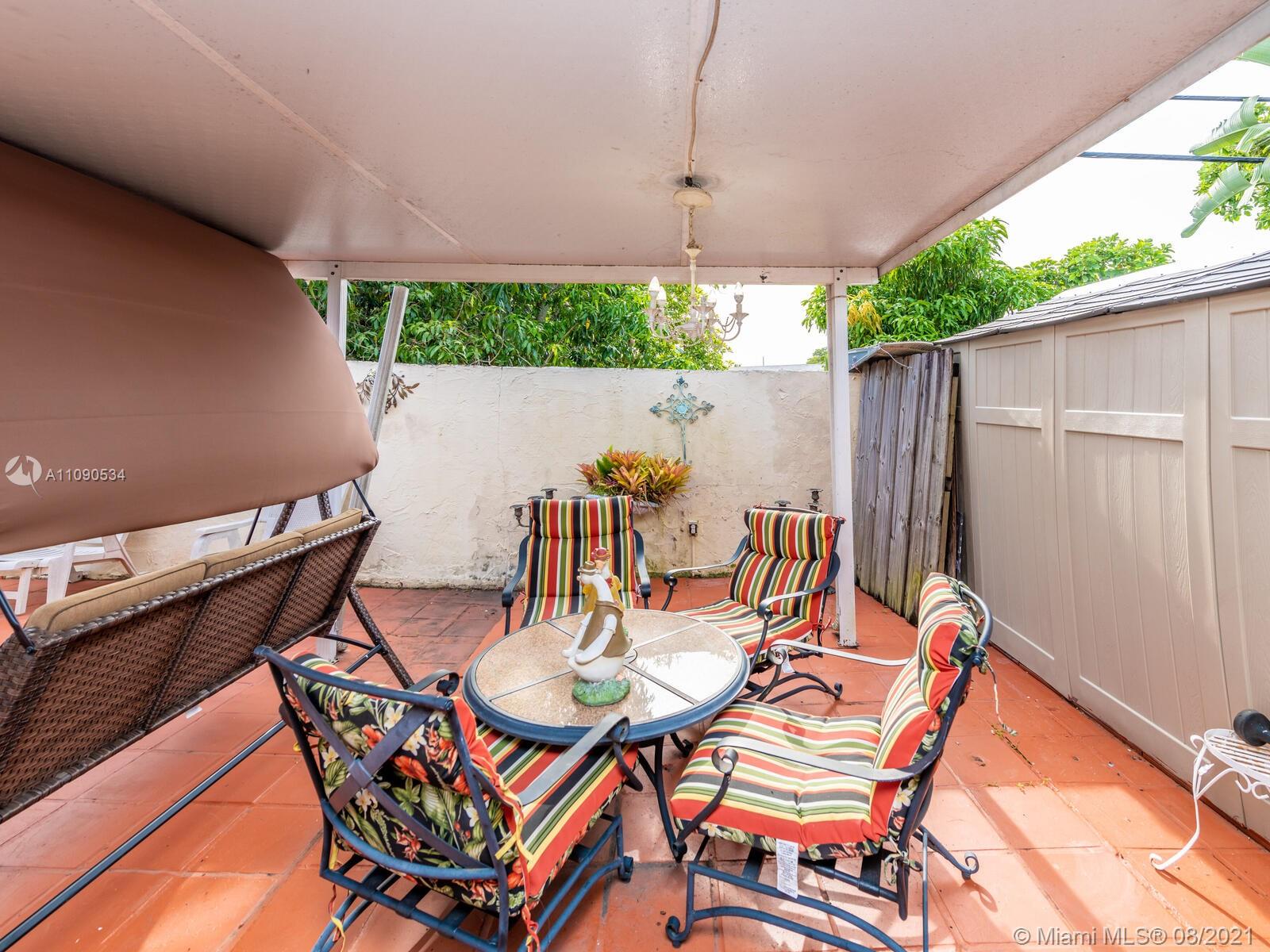 2820 Southwest 95th Avenue Miami, FL 33165 - Photo 67 of 100 a outdoor dining space with furniture and outdoor view