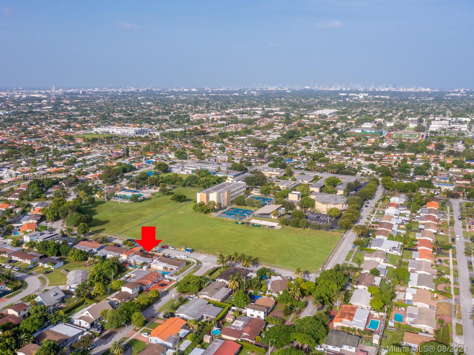 2820 Southwest 95th Avenue Miami, FL 33165 - Photo 72 of 100 an aerial view of residential houses with outdoor space and trees