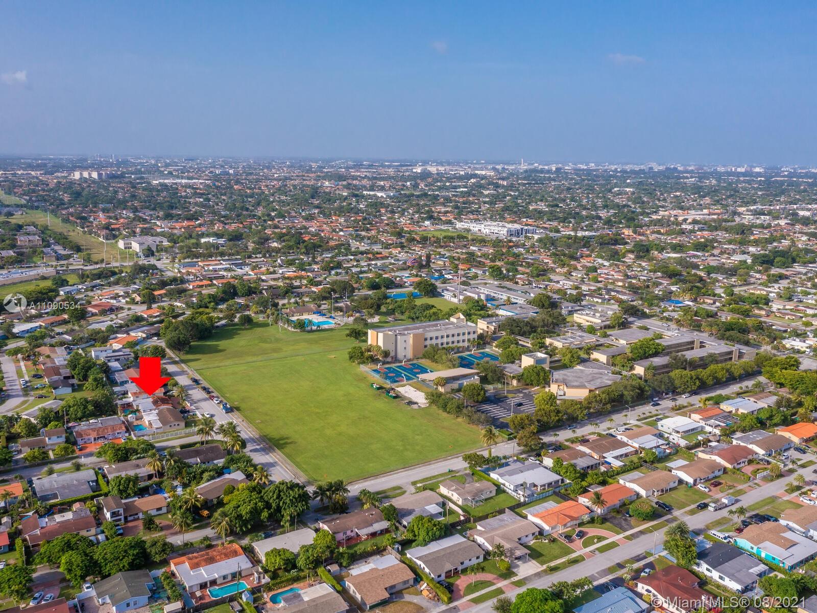 2820 Southwest 95th Avenue Miami, FL 33165 - Photo 73 of 100 an aerial view of residential houses with outdoor space and trees