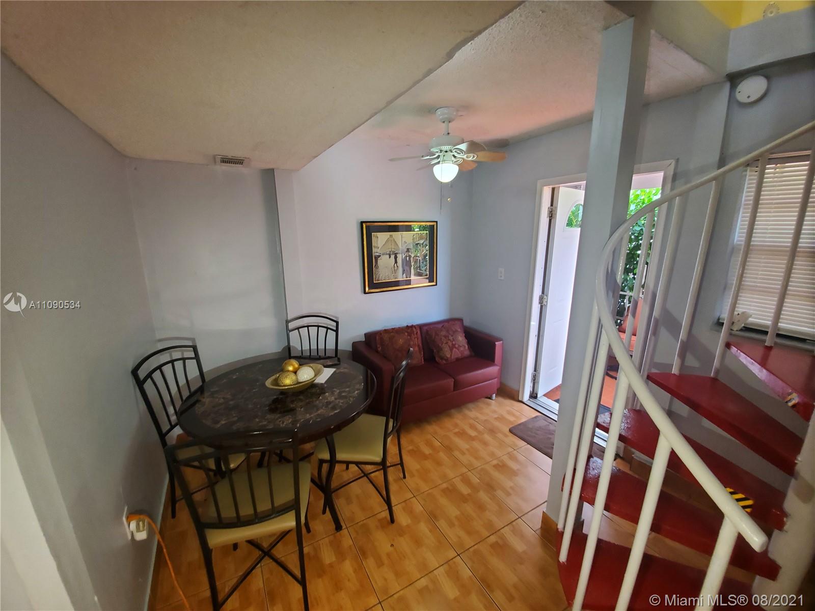 2820 Southwest 95th Avenue Miami, FL 33165 - Photo 81 of 100 a view of a livingroom with furniture and a table