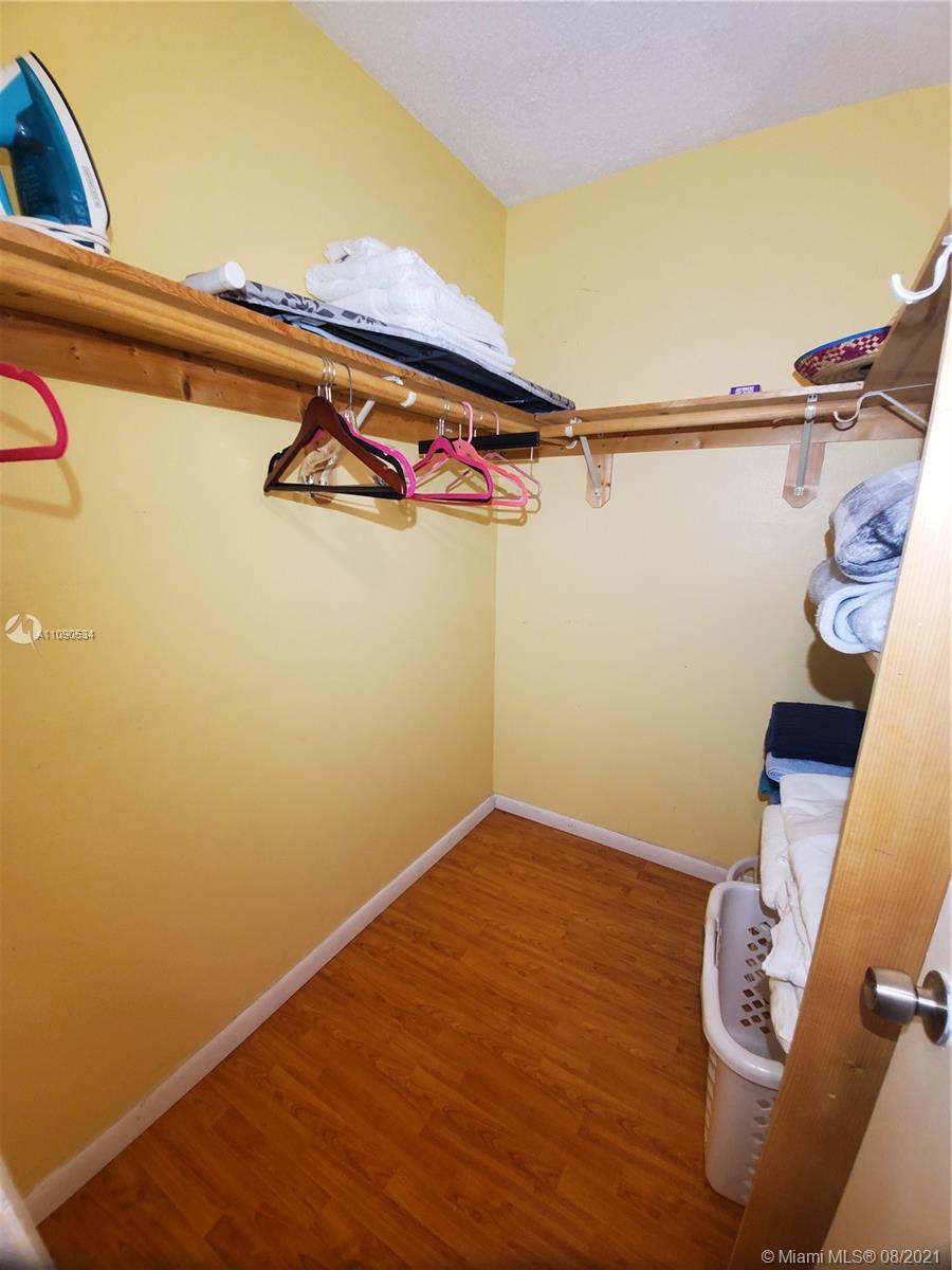 2820 Southwest 95th Avenue Miami, FL 33165 - Photo 94 of 100 a view of a room with racks on the wall