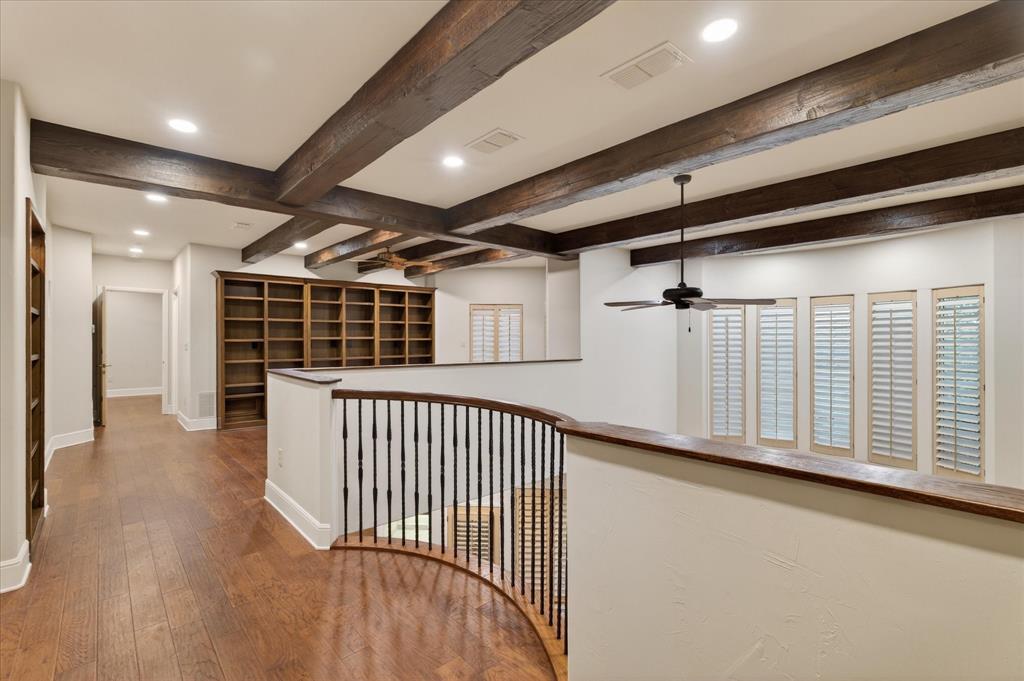 701 West Walcott Street Pilot Point, TX 76258 - Photo 34 of 40 Hallway featuring recessed lighting, beamed ceiling, wood-type flooring, and an upstairs landing