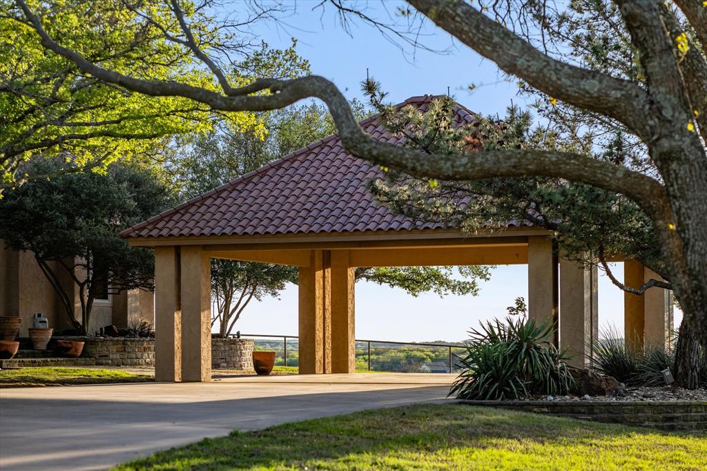 701 West Walcott Street Pilot Point, TX 76258 - Photo 7 of 40 a view of a house with a swimming pool