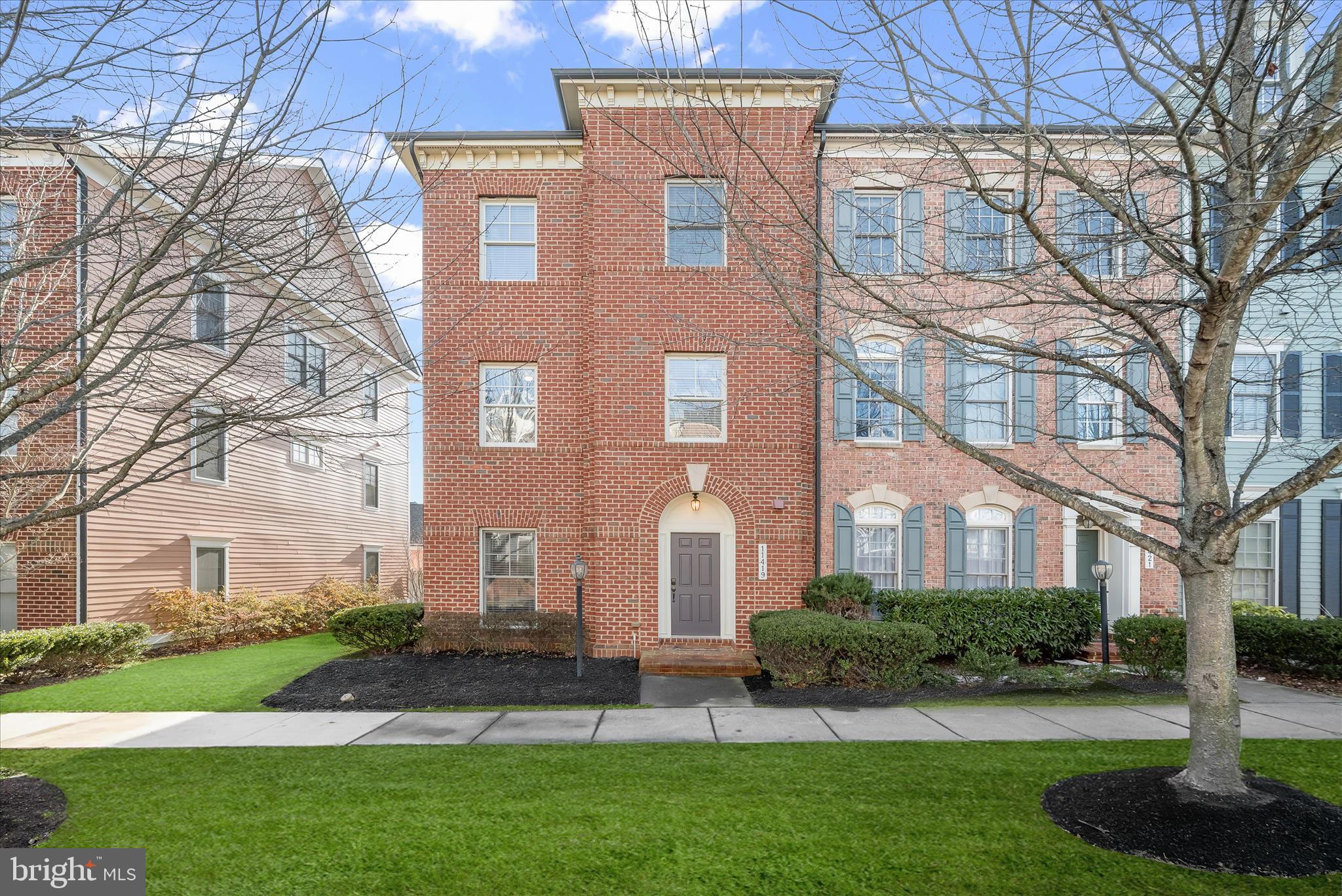 11419 Iager Boulevard Fulton, MD 20759 - Photo 1 of 58 a view of a brick building next to a yard