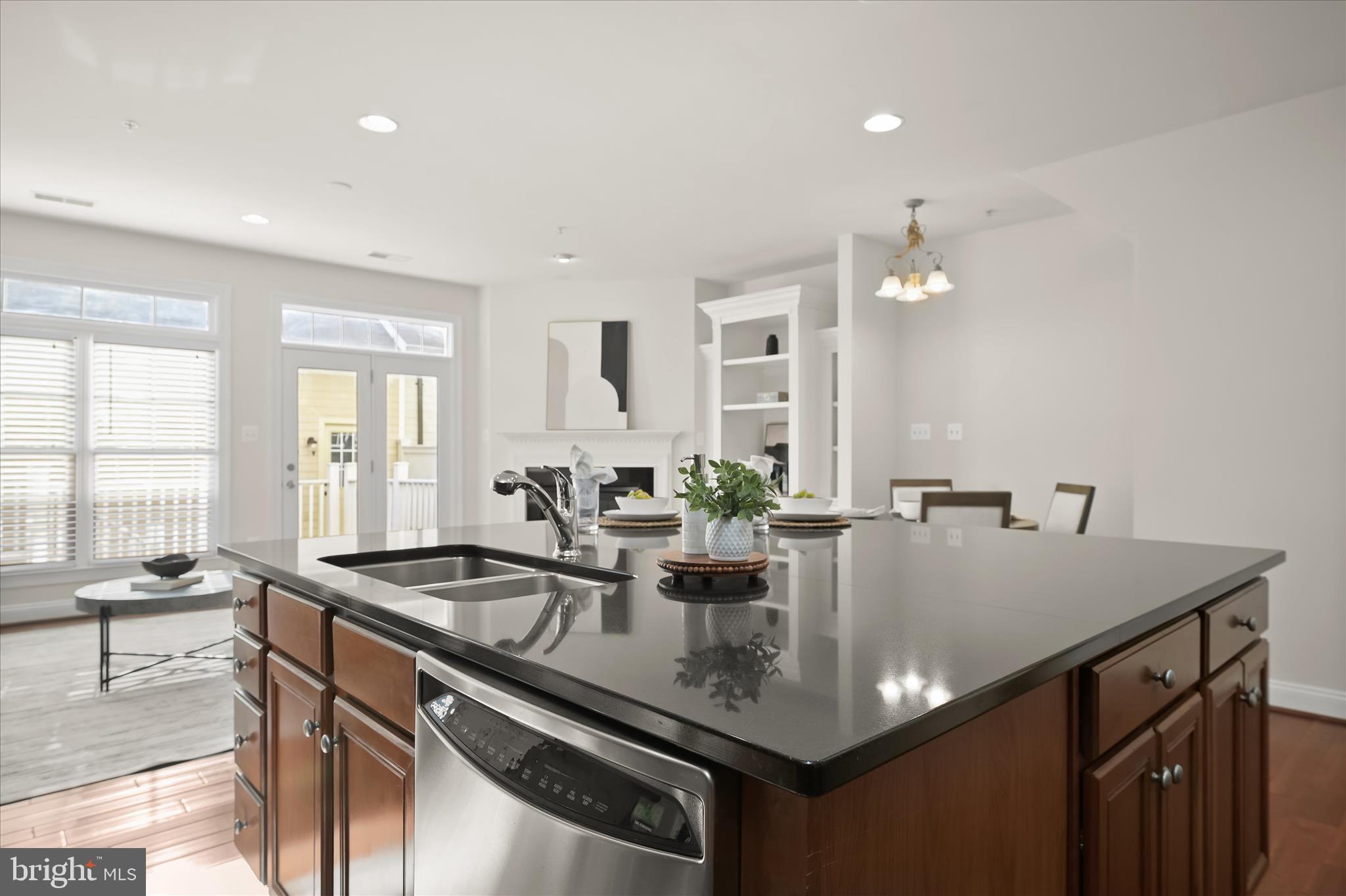 11419 Iager Boulevard Fulton, MD 20759 - Photo 11 of 58 a view of kitchen island a sink and living room