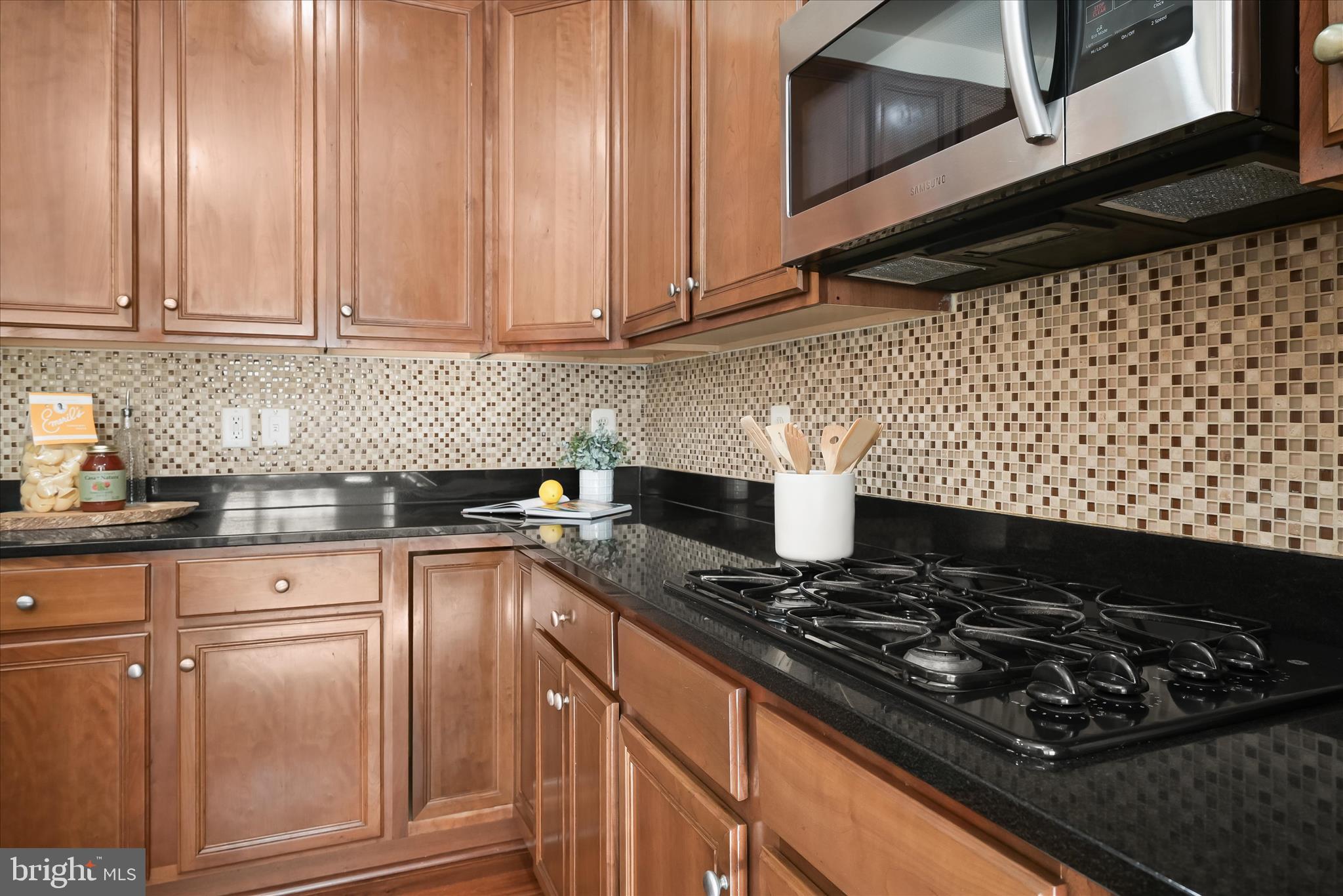 11419 Iager Boulevard Fulton, MD 20759 - Photo 16 of 58 a kitchen with granite countertop stainless steel appliances and cabinets