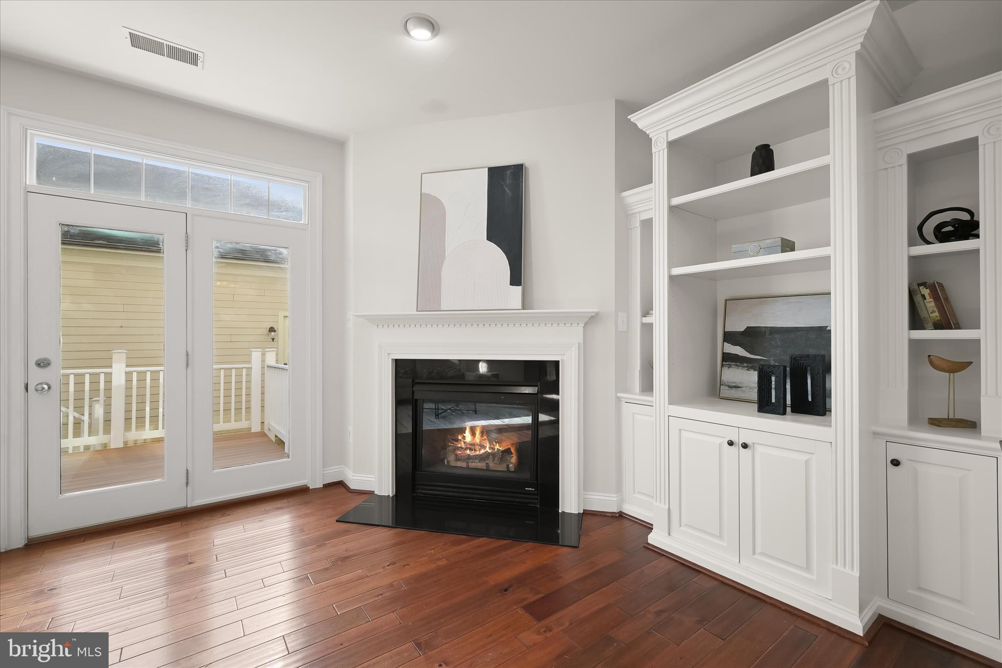 11419 Iager Boulevard Fulton, MD 20759 - Photo 19 of 58 a living room with furniture and a fireplace