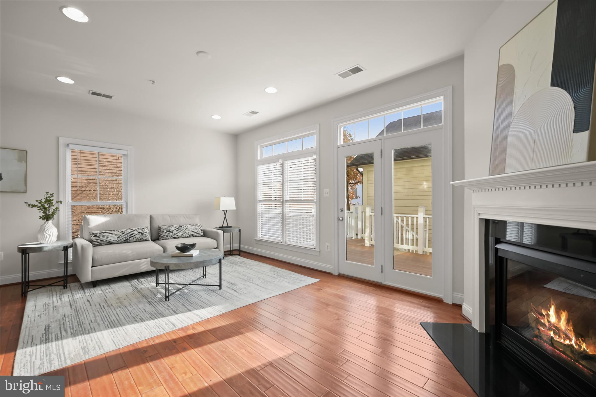 11419 Iager Boulevard Fulton, MD 20759 - Photo 21 of 58 a living room with furniture and a fireplace
