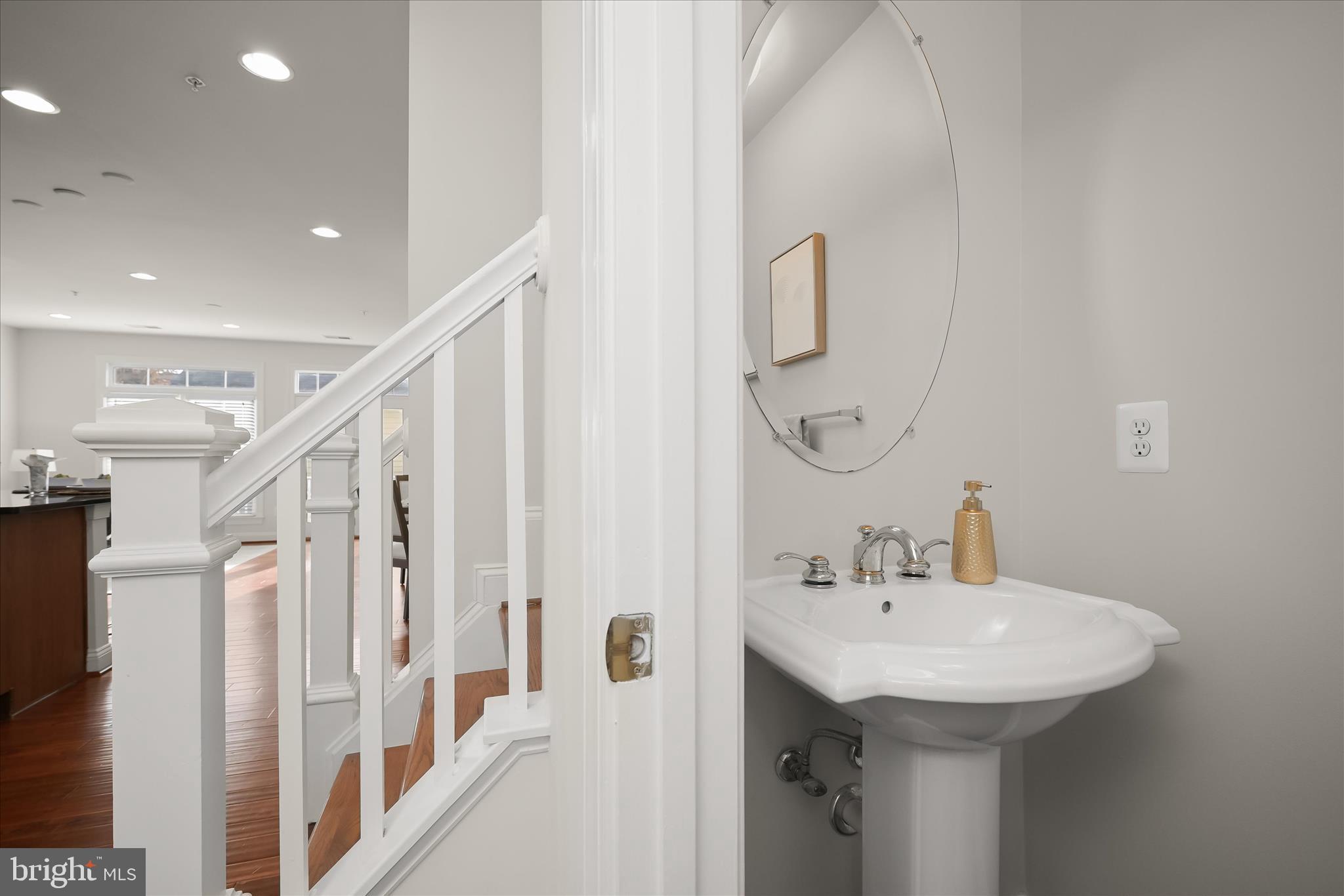11419 Iager Boulevard Fulton, MD 20759 - Photo 24 of 58 a bathroom with a sink a mirror and a shower