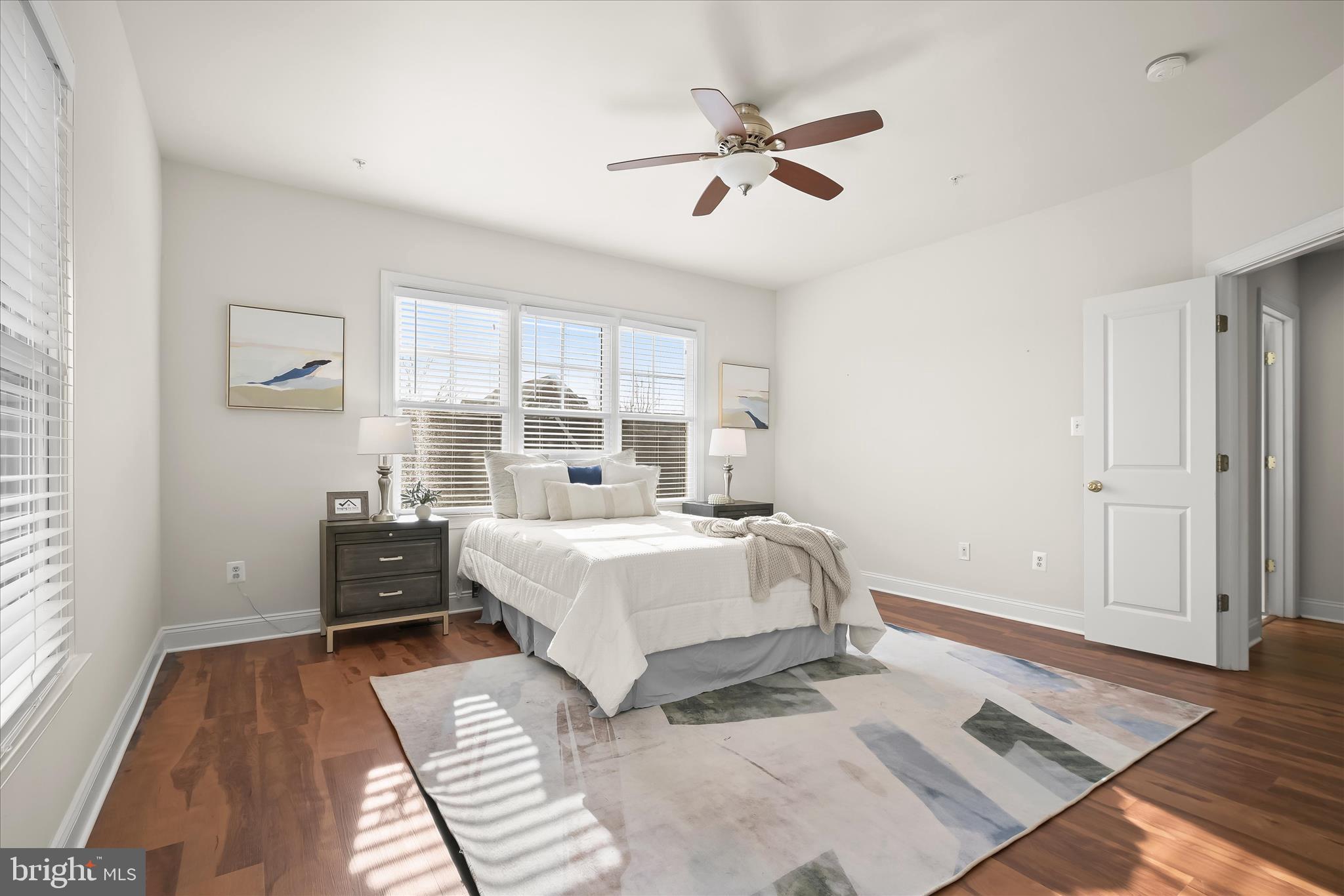 11419 Iager Boulevard Fulton, MD 20759 - Photo 27 of 58 a bedroom with a bed and a window
