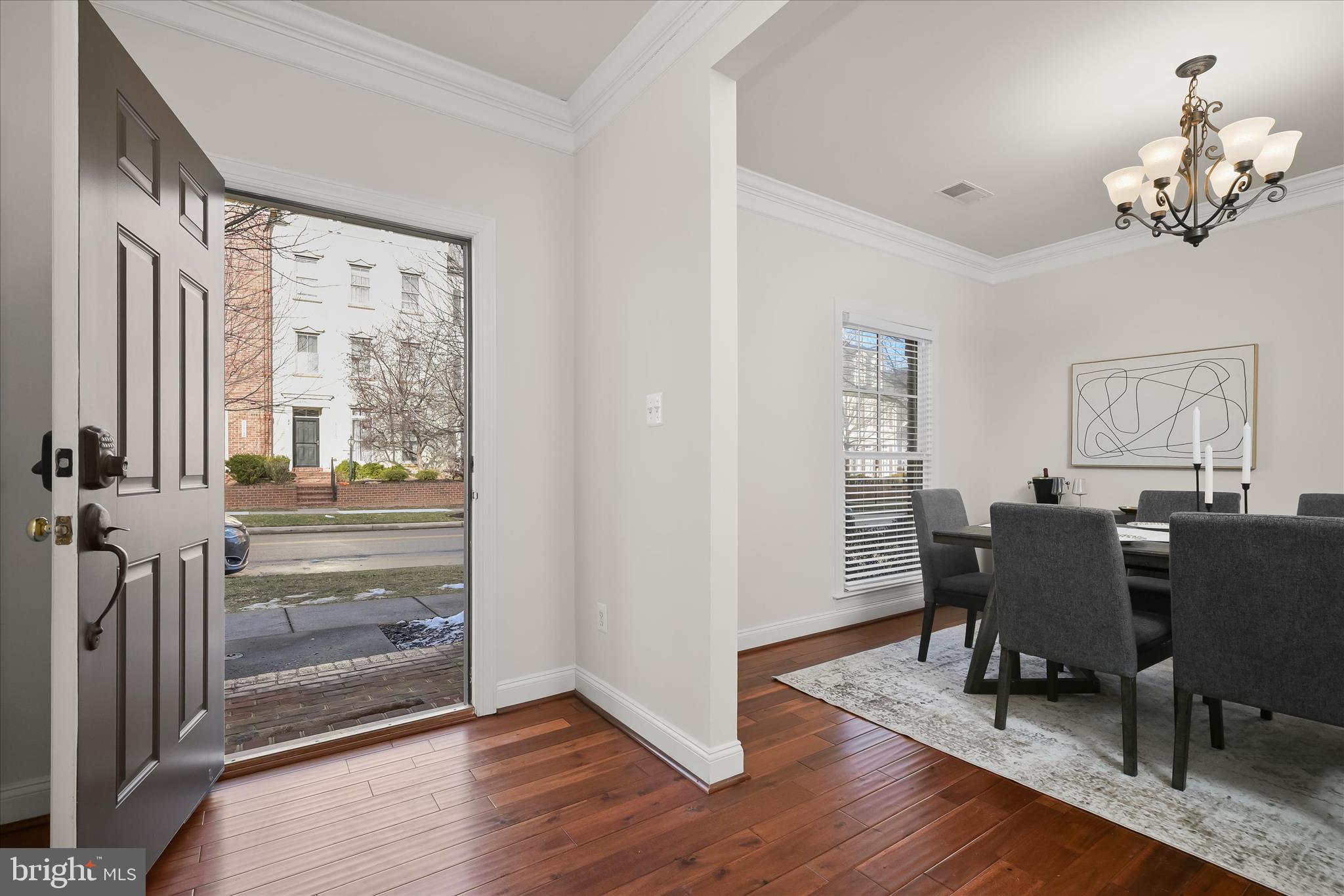 11419 Iager Boulevard Fulton, MD 20759 - Photo 3 of 58 a view of a dining room with furniture window and wooden floor