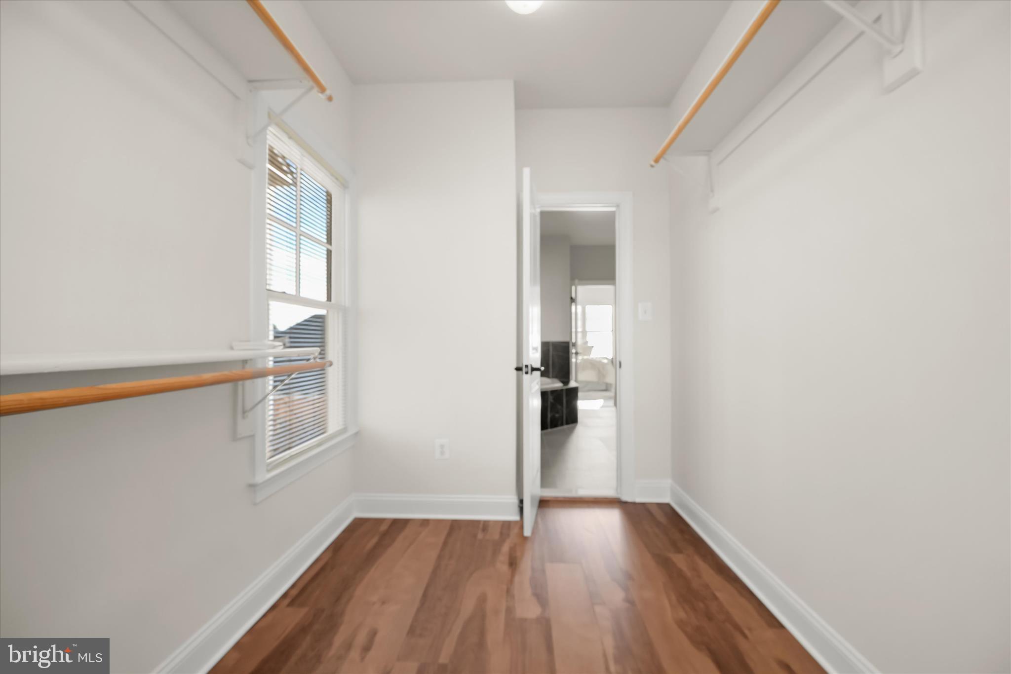 11419 Iager Boulevard Fulton, MD 20759 - Photo 36 of 58 wooden floor in an empty room with a window