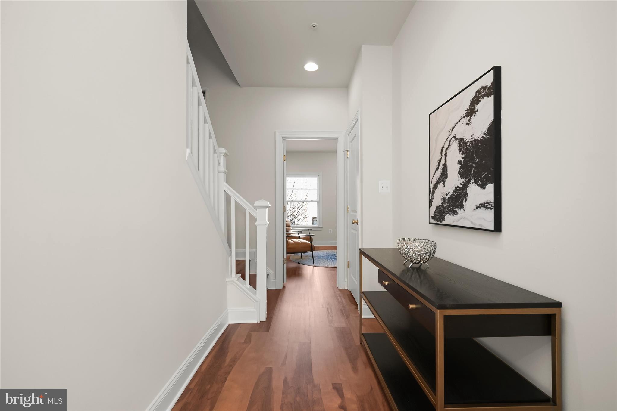 11419 Iager Boulevard Fulton, MD 20759 - Photo 38 of 58 a view of a hallway view with wooden floor and staircase