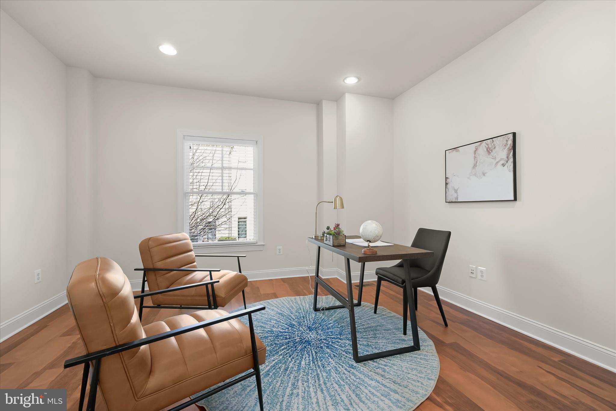 11419 Iager Boulevard Fulton, MD 20759 - Photo 39 of 58 a work room with furniture wooden floor and windows