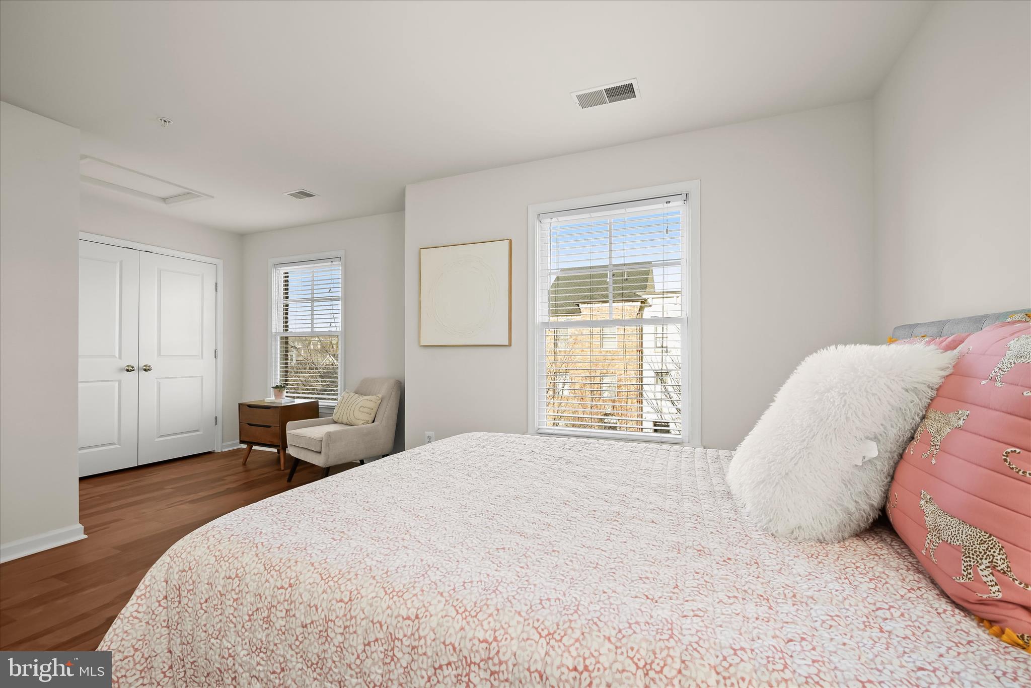 11419 Iager Boulevard Fulton, MD 20759 - Photo 46 of 58 a bedroom with a large bed and wooden floor