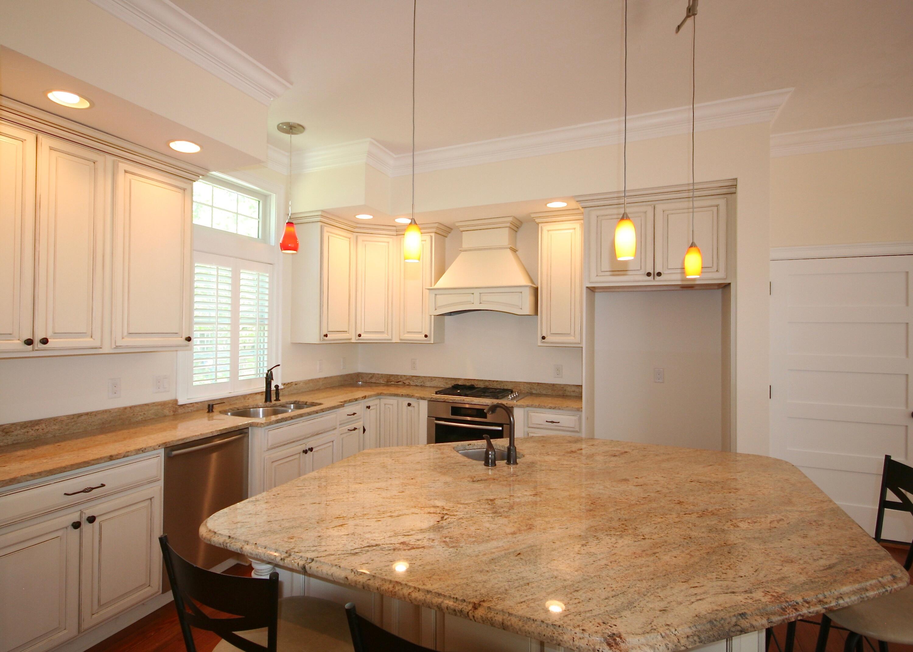 5 Point Road Mashpee, MA 02649 - Photo 11 of 29 a kitchen with a stove a sink and a refrigerator