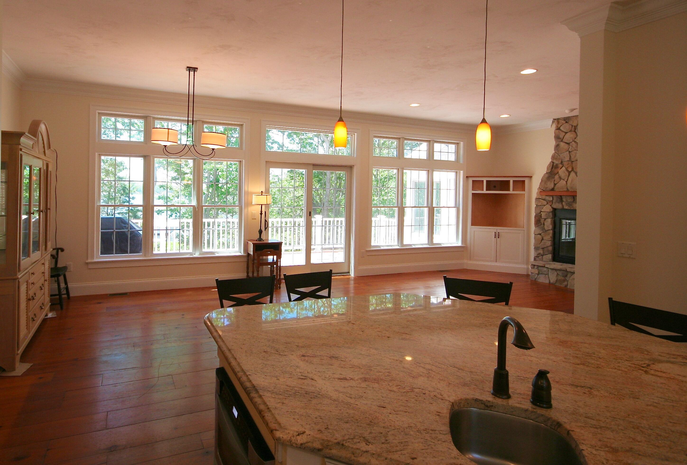5 Point Road Mashpee, MA 02649 - Photo 14 of 29 a kitchen with sink table and chairs