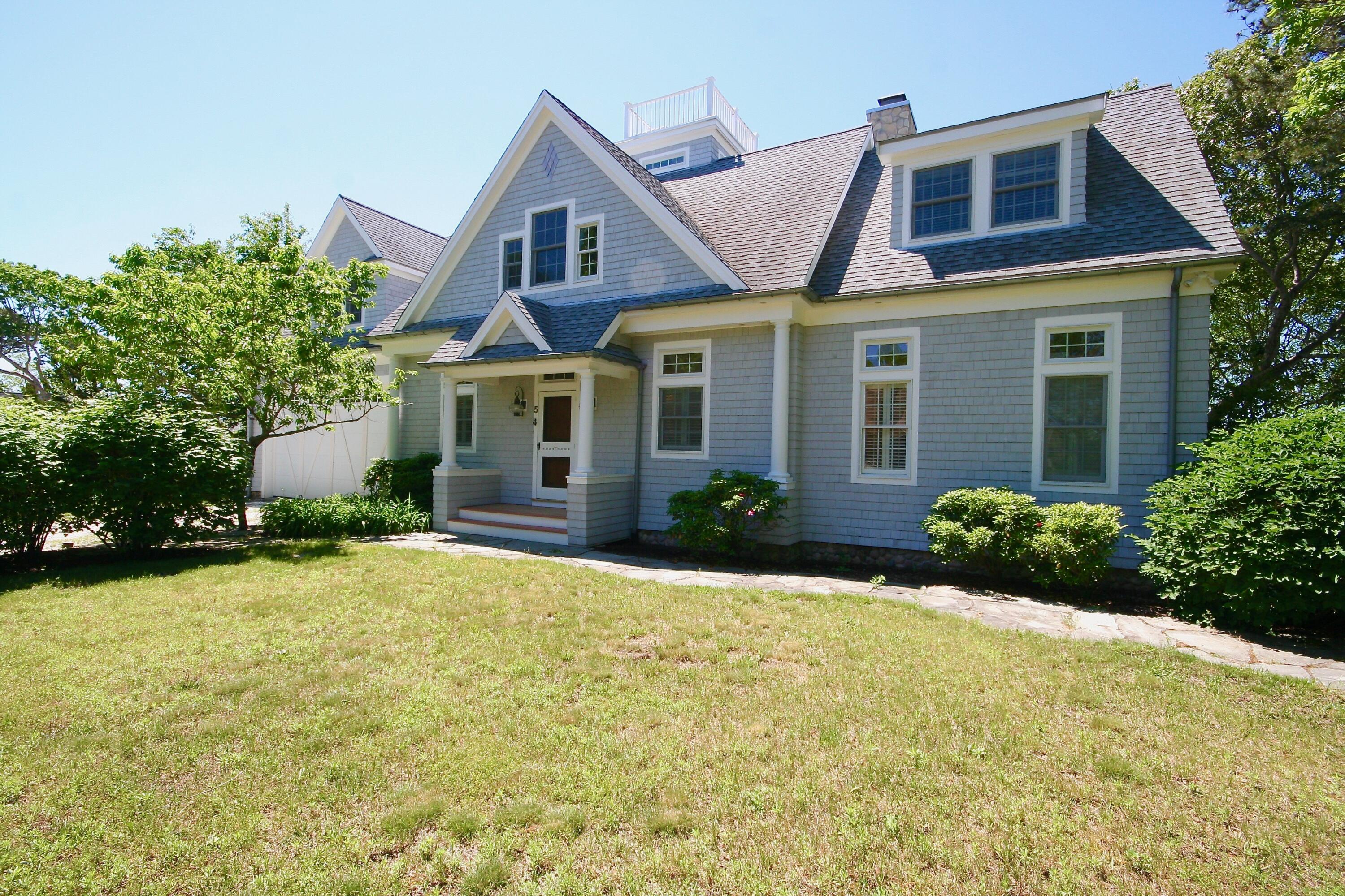 5 Point Road Mashpee, MA 02649 - Photo 2 of 29 front view of a house with a yard