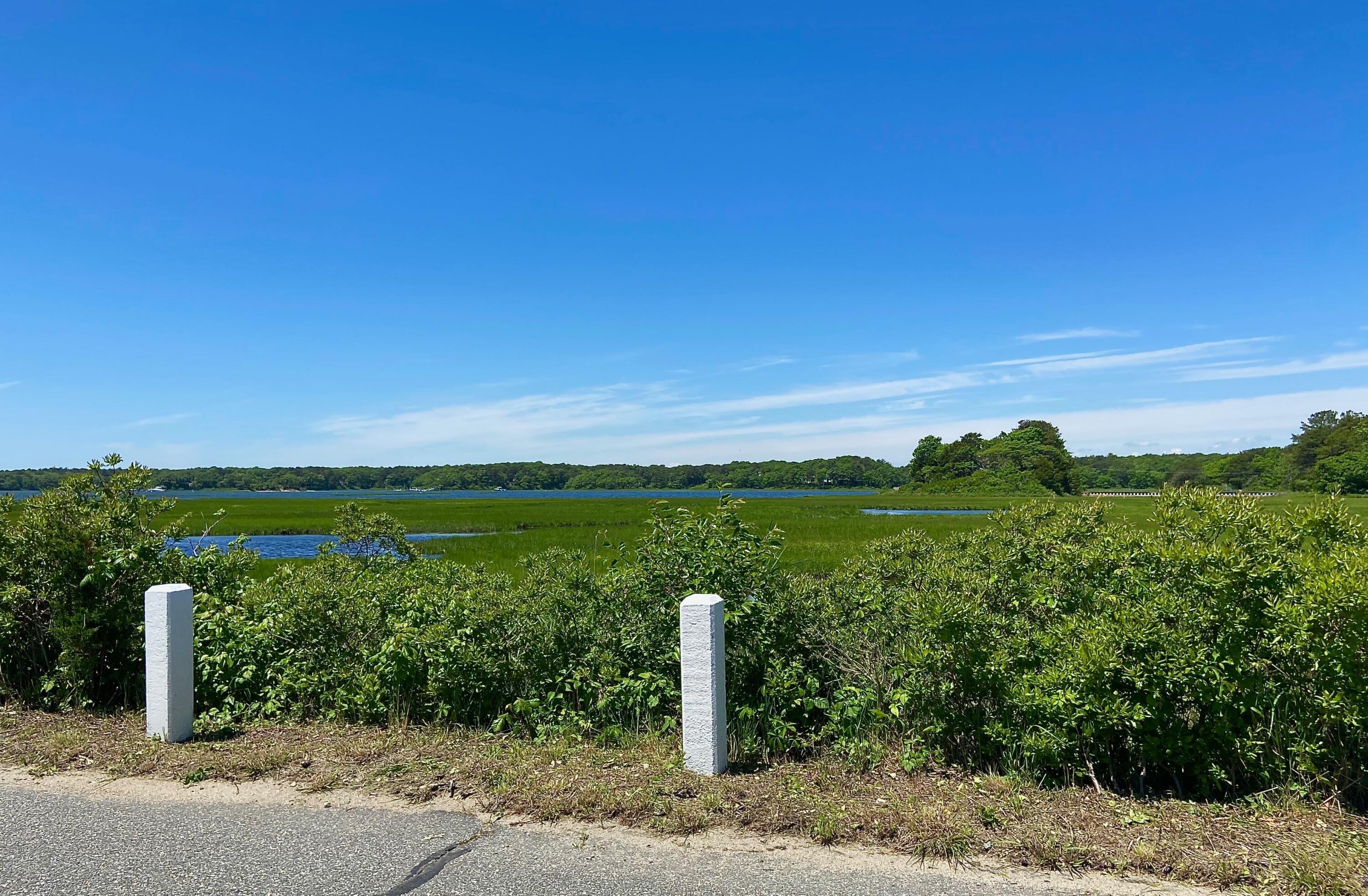 5 Point Road Mashpee, MA 02649 - Photo 6 of 29 a view of a city with flower garden