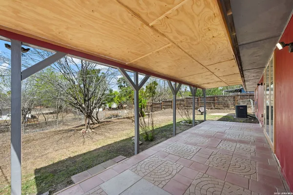 a view of porch with a patio