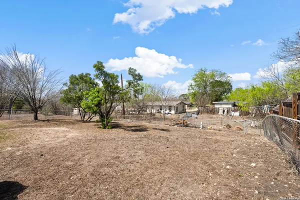 a view of yard with trees